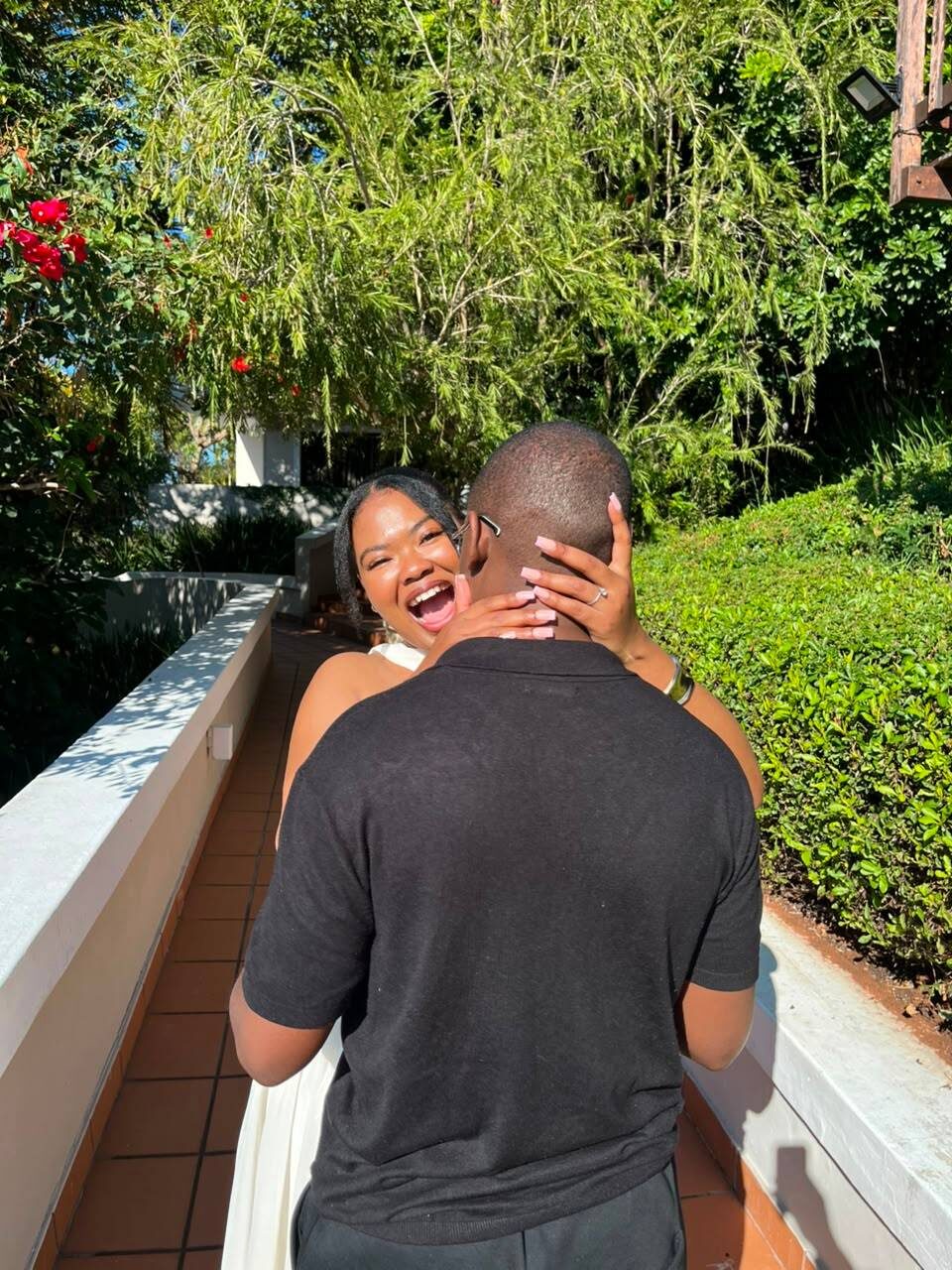 Ellen laughing with Chukwuma